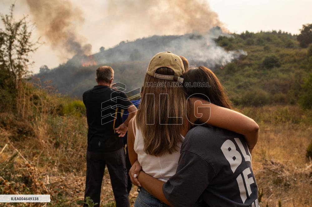 Wildfires Drive Evacuations in Leon