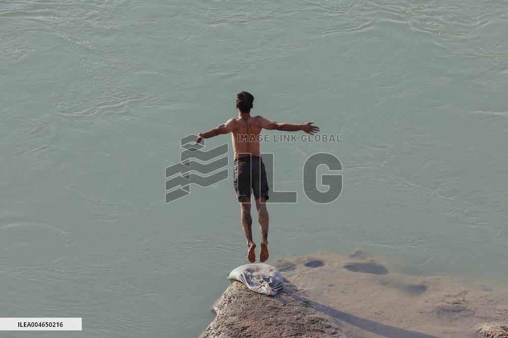 Young Iraqis Swim In The River - Erbil