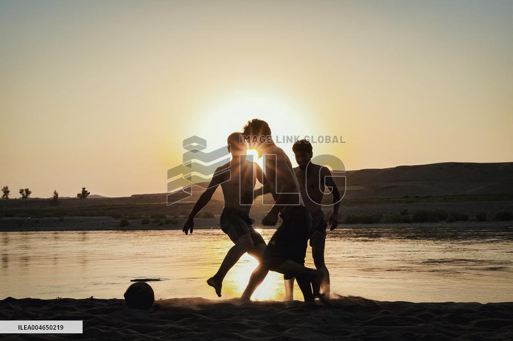Young Iraqis Swim In The River - Erbil