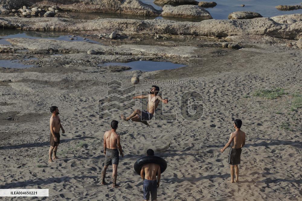 Young Iraqis Swim In The River - Erbil