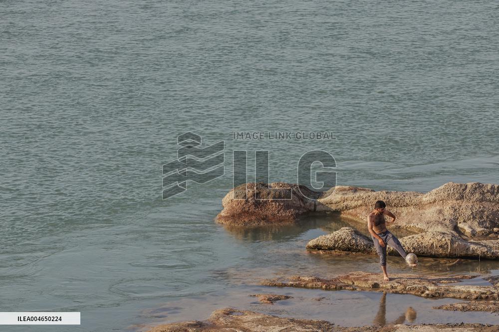 Young Iraqis Swim In The River - Erbil
