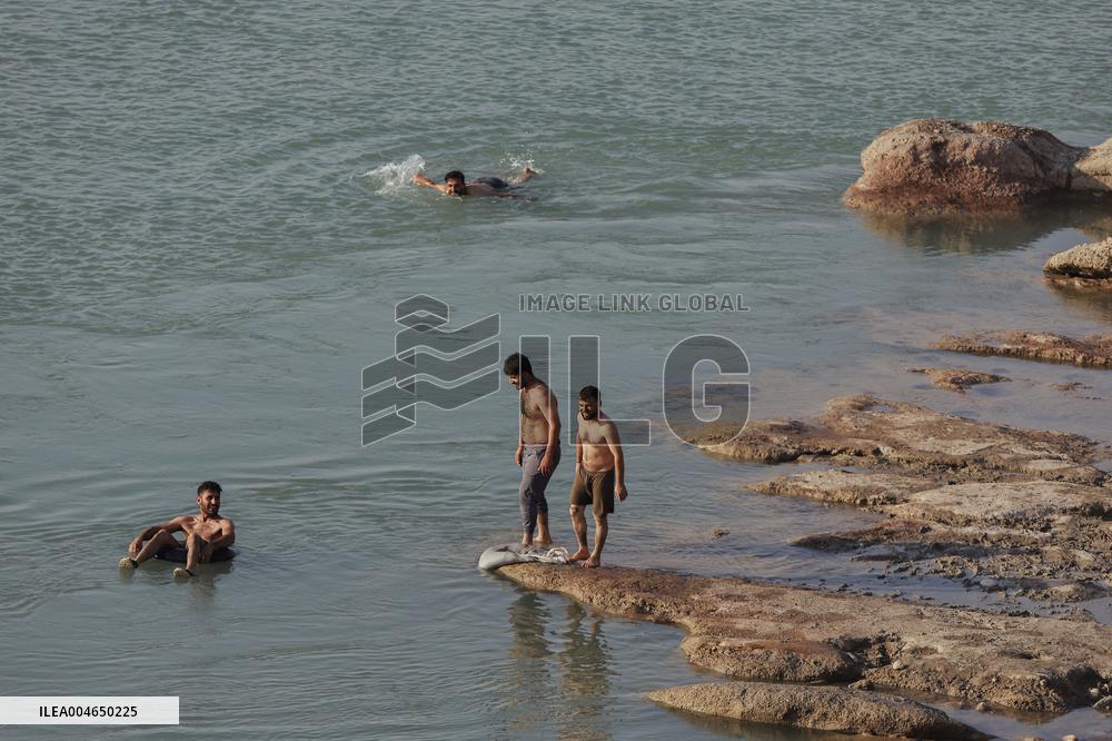 Young Iraqis Swim In The River - Erbil
