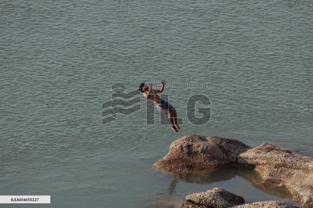 Young Iraqis Swim In The River - Erbil