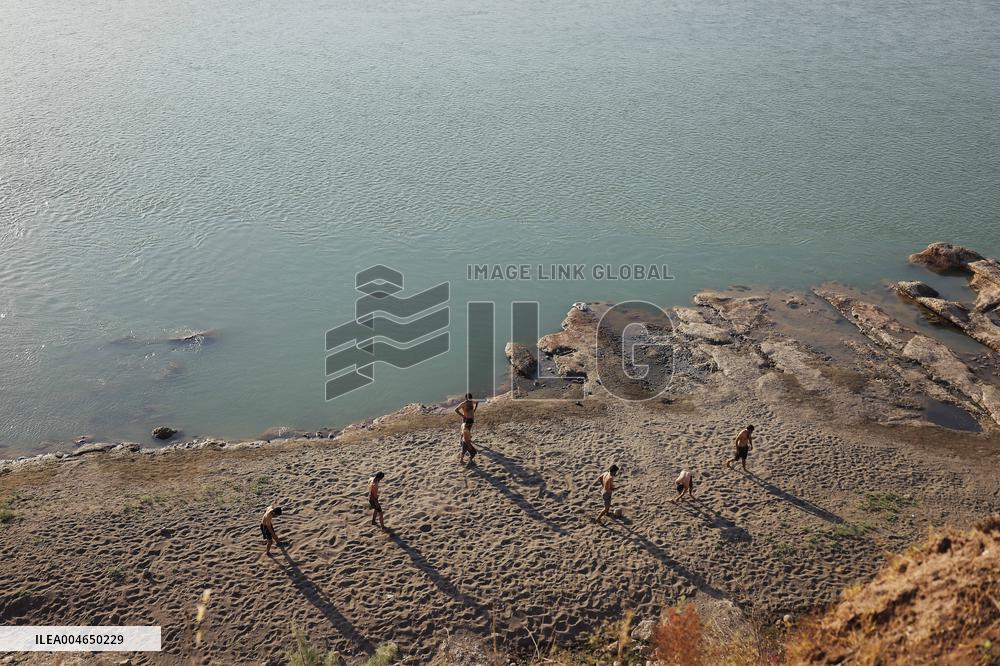 Young Iraqis Swim In The River - Erbil