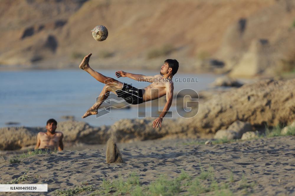 Young Iraqis Swim In The River - Erbil