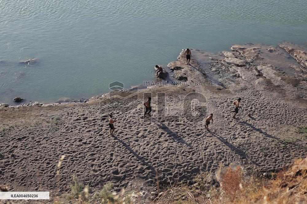 Young Iraqis Swim In The River - Erbil