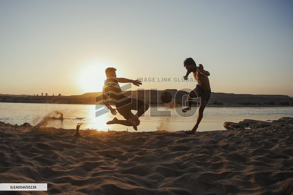 Young Iraqis Swim In The River - Erbil