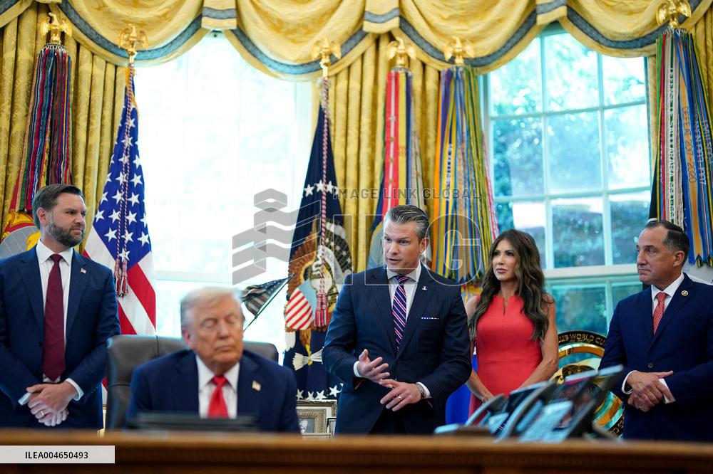 White House - Trump Signing Executive Order in The Oval Office
