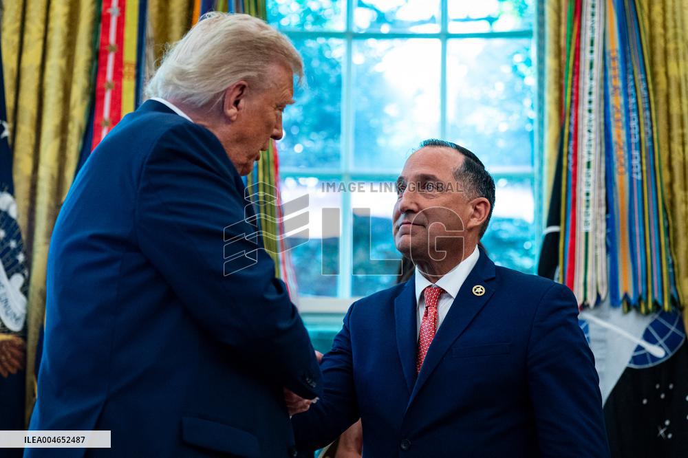 Trump Signs Executive Order In Oval Office - DC