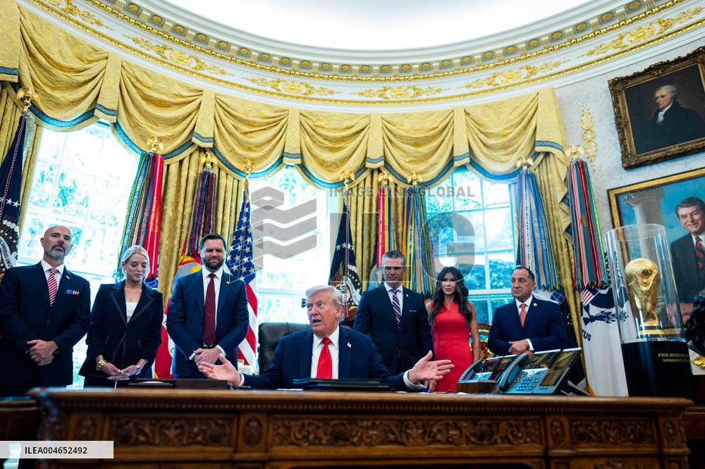 Trump Signs Executive Order In Oval Office - DC