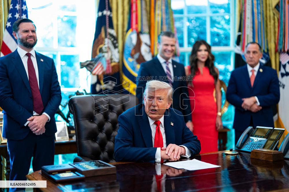 Trump Signs Executive Order In Oval Office - DC