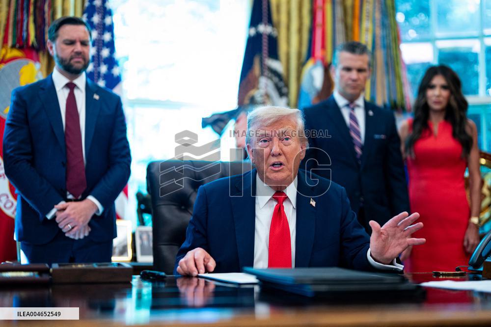 Trump Signs Executive Order In Oval Office - DC