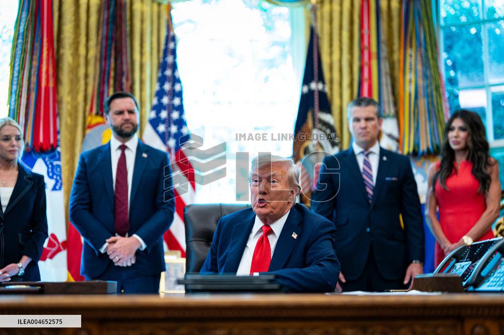 Trump Signs Executive Order In Oval Office - DC