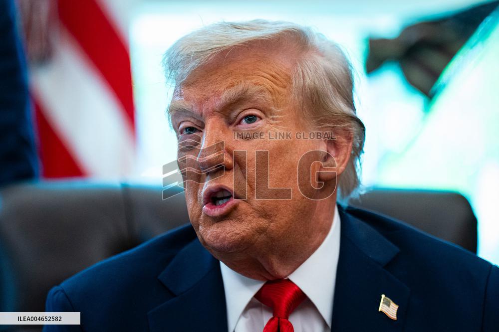 Trump Signs Executive Order In Oval Office - DC