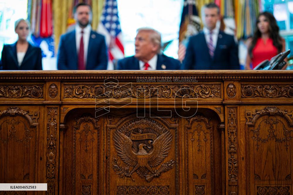 Trump Signs Executive Order In Oval Office - DC