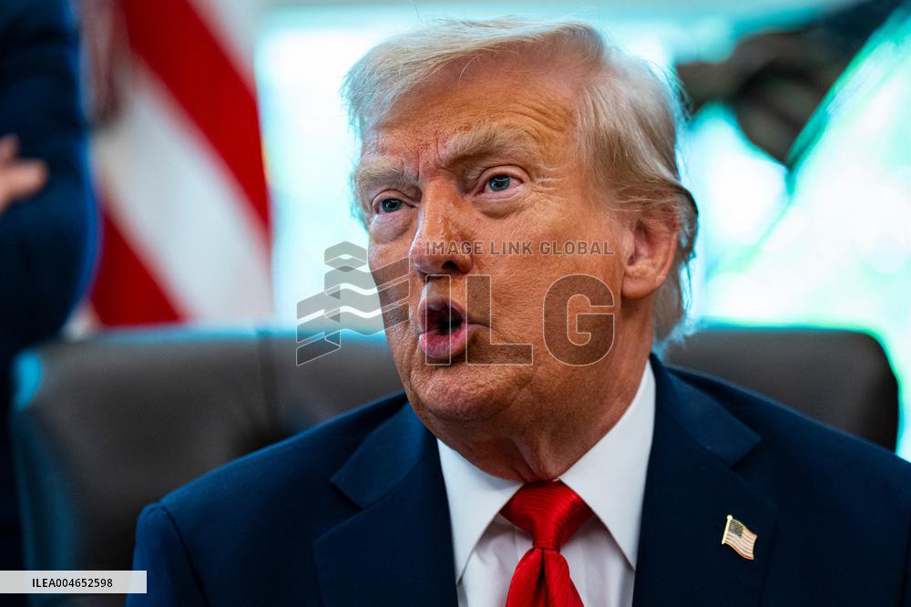 Trump Signs Executive Order In Oval Office - DC