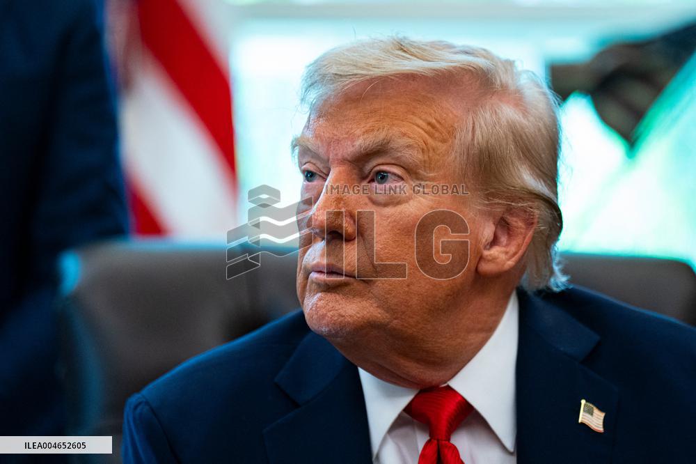 Trump Signs Executive Order In Oval Office - DC