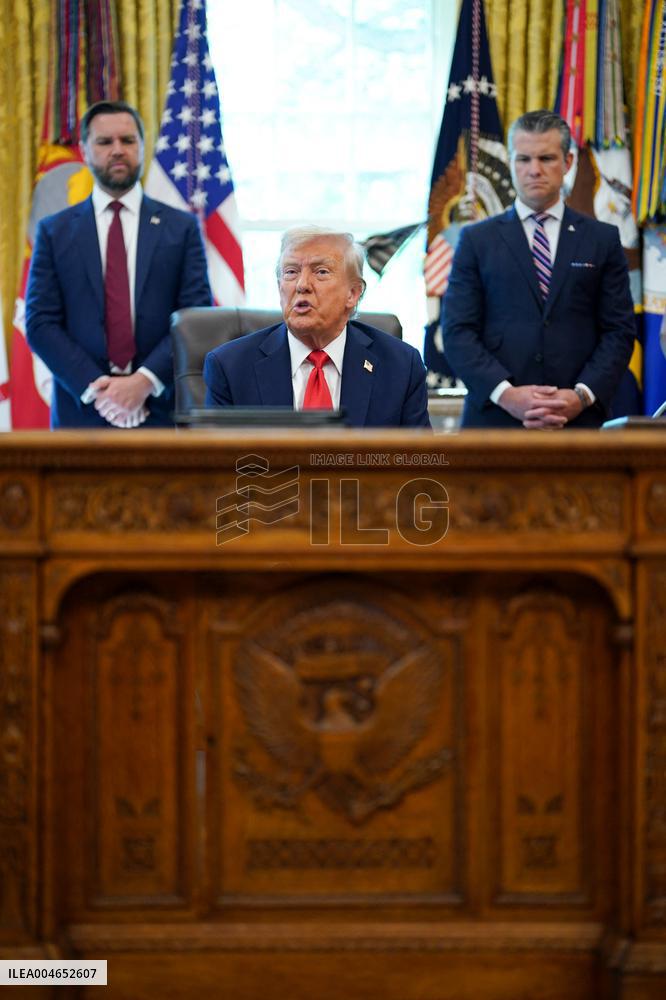 Trump Signs Executive Order In Oval Office - DC