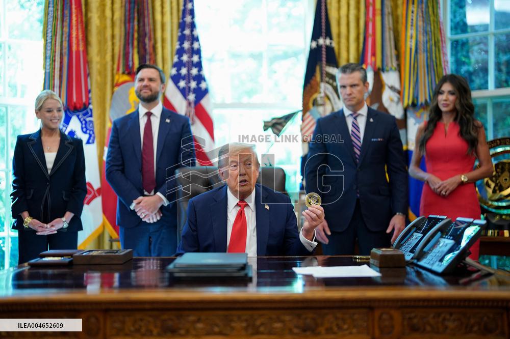 Trump Signs Executive Order In Oval Office - DC