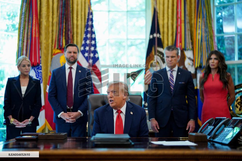 Trump Signs Executive Order In Oval Office - DC