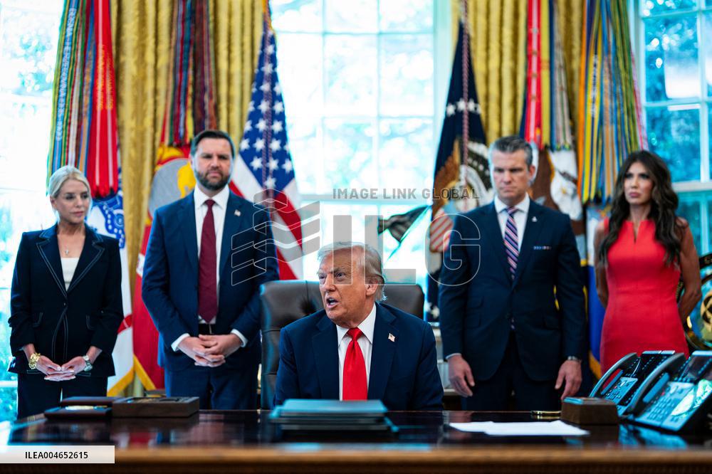 Trump Signs Executive Order In Oval Office - DC