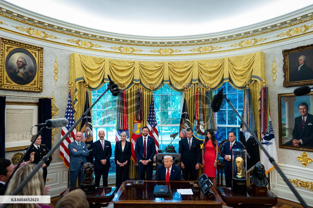 Trump Signs Executive Order In Oval Office - DC