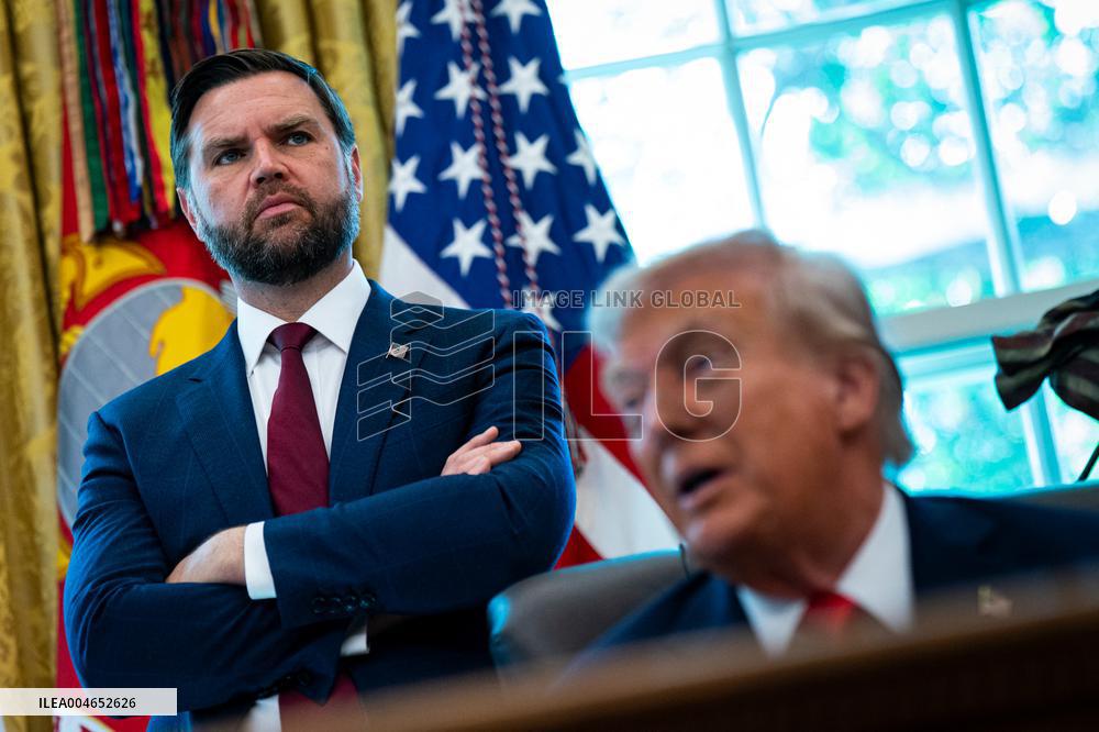 Trump Signs Executive Order In Oval Office - DC