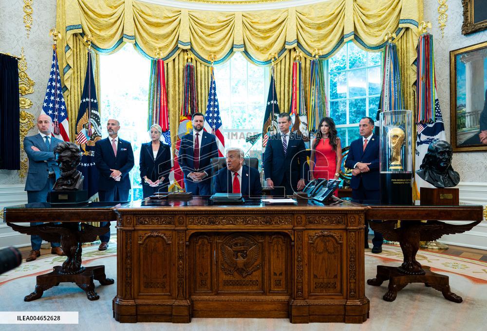 Trump Signs Executive Order In Oval Office - DC