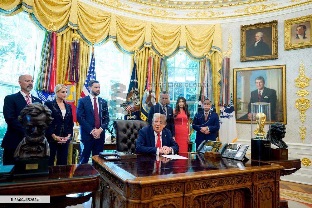 Trump Signs Executive Order In Oval Office - DC