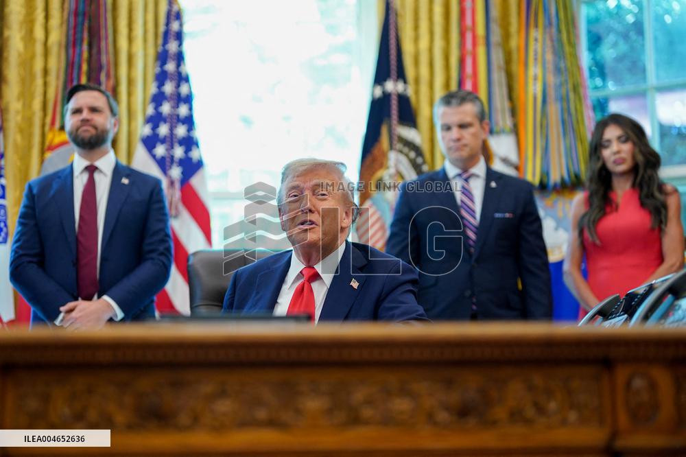 Trump Signs Executive Order In Oval Office - DC