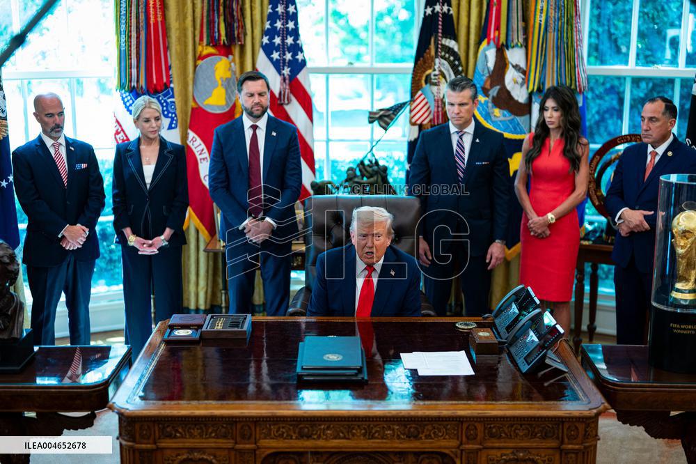 Trump Signs Executive Order In Oval Office - DC