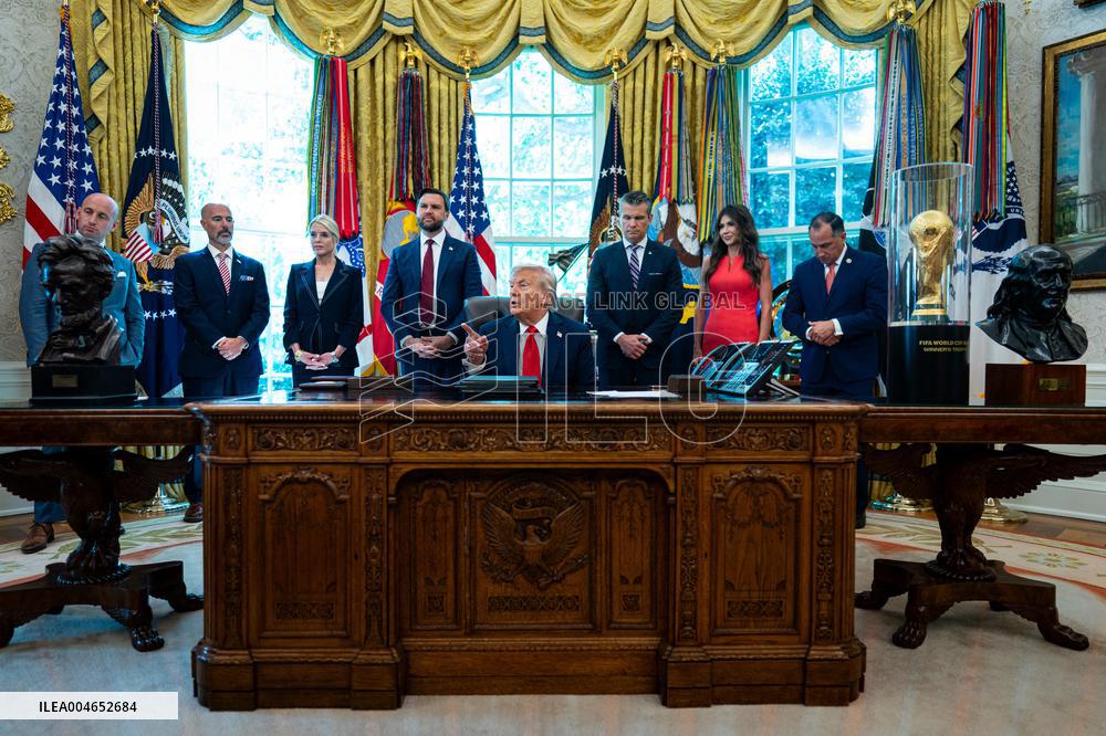 Trump Signs Executive Order In Oval Office - DC