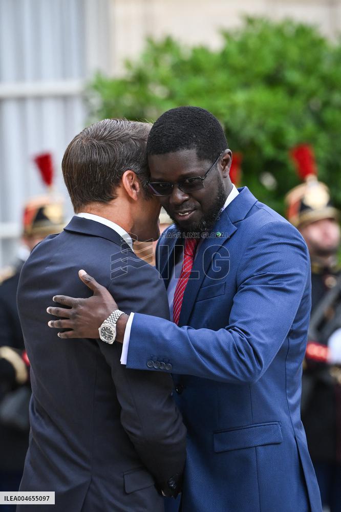 Emmanuel Macron welcomes Bassirou Diomaye Faye at the Elysee FA
