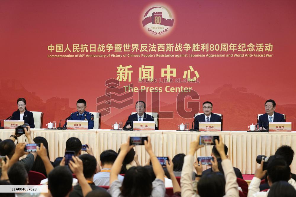 Chinese government officials at press conference
