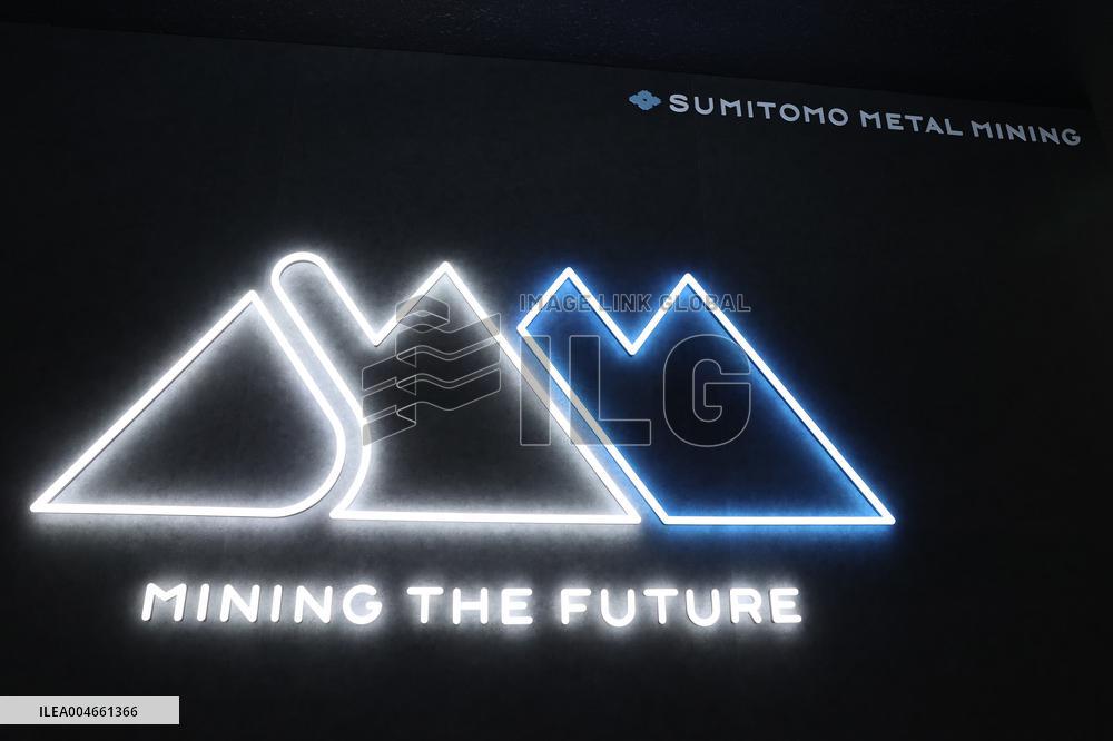 Sumitomo Metal Mining signboard and logo