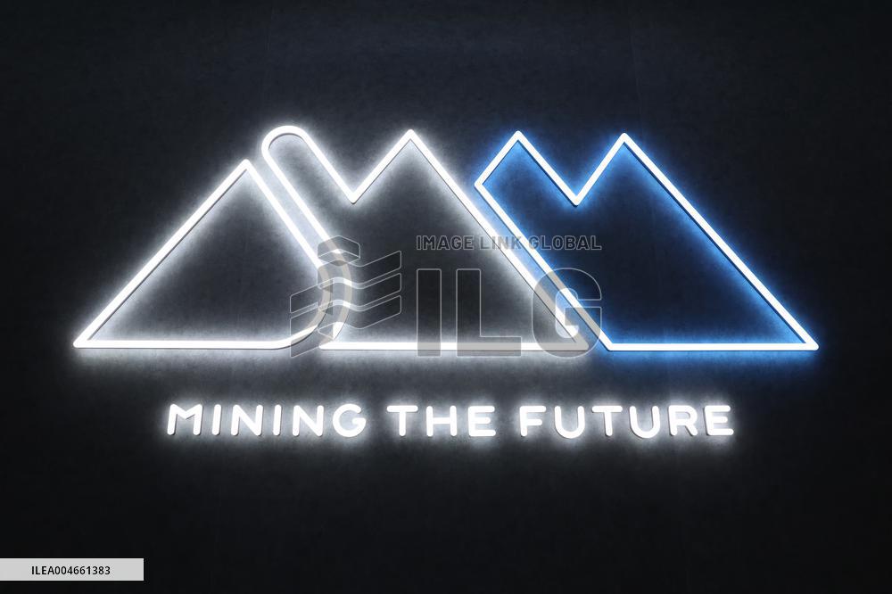 Sumitomo Metal Mining signboard and logo