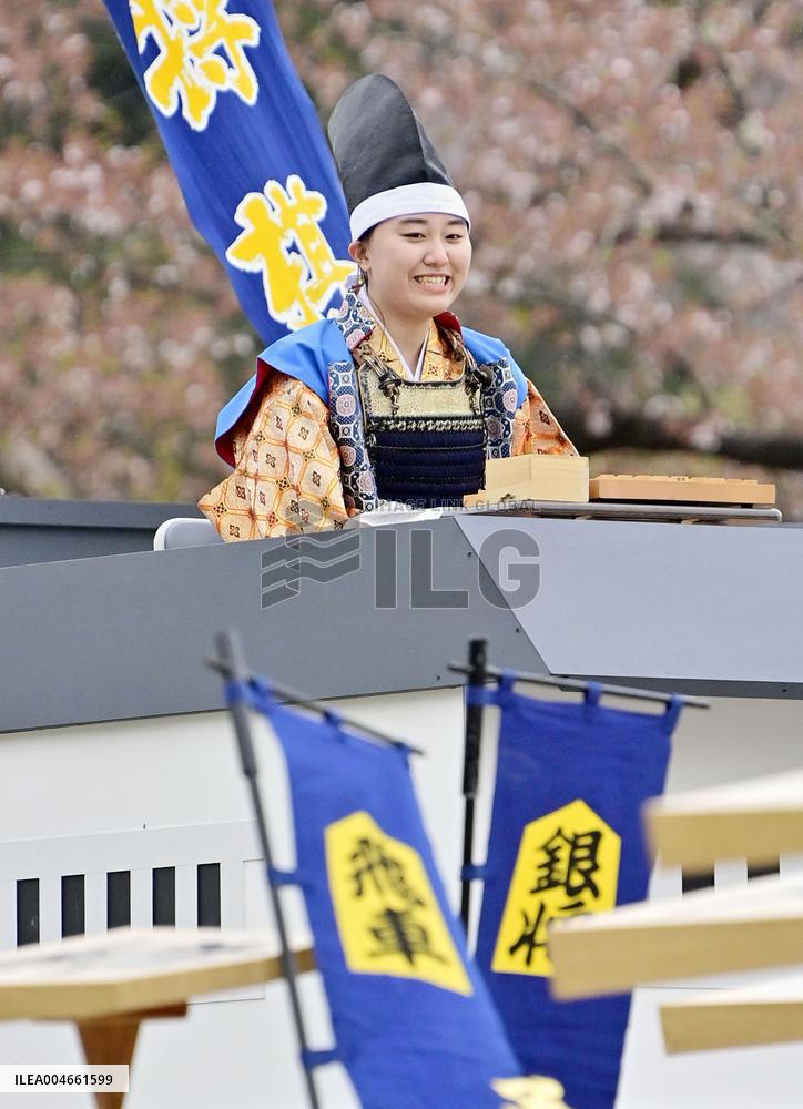 Shogi played with human pieces