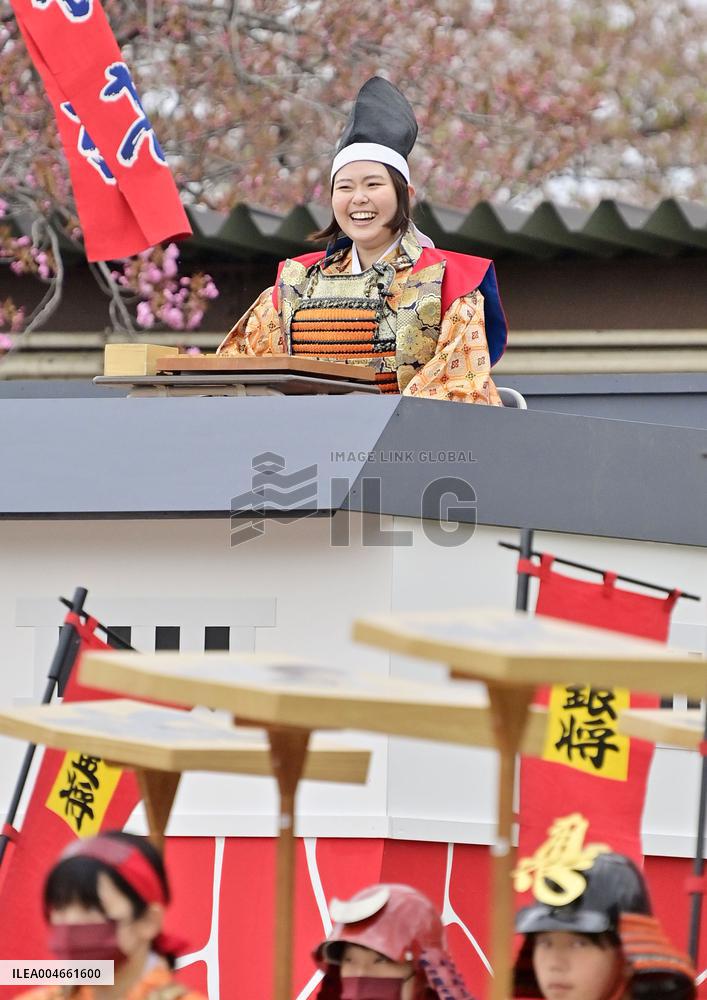 Shogi played with human pieces