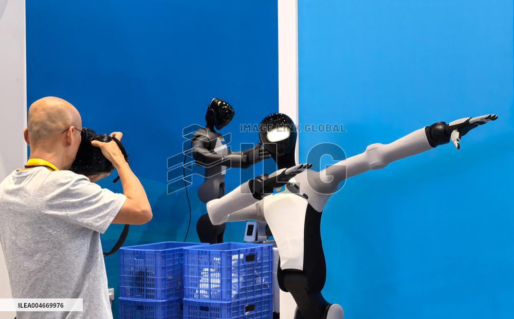 Robots Welcome World Media At The SCO - Tianjin