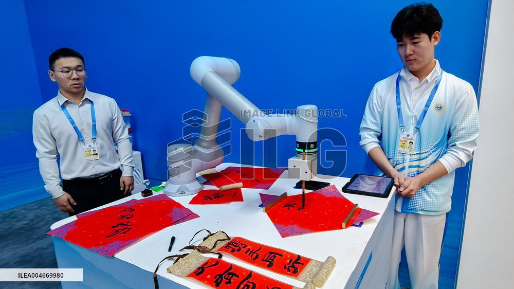 Robots Welcome World Media At The SCO - Tianjin