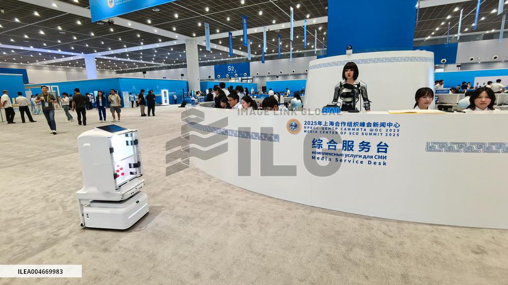 Robots Welcome World Media At The SCO - Tianjin