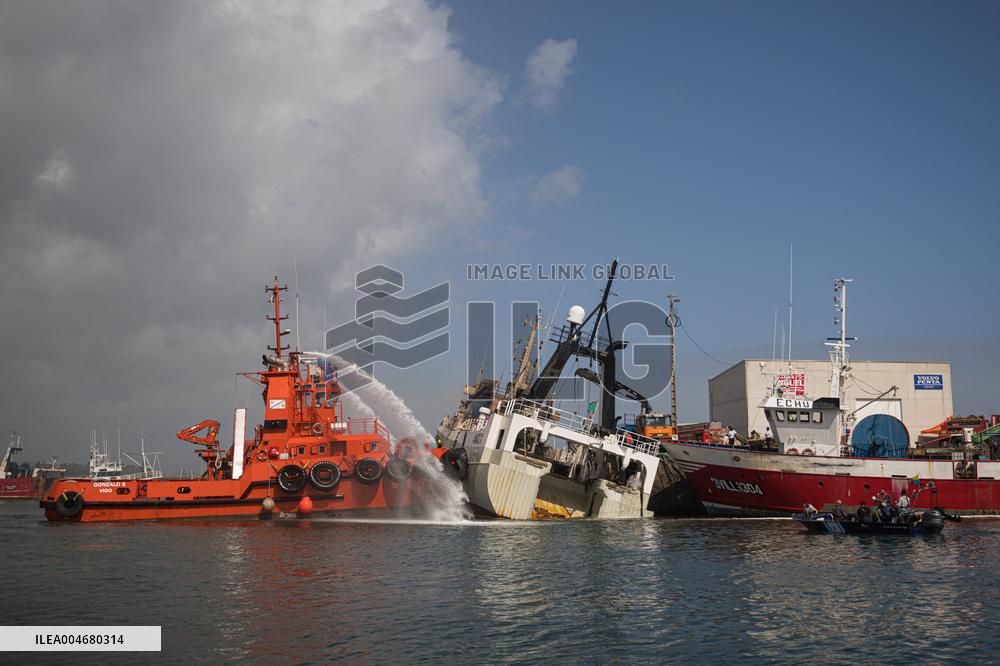 A Ship Continues To Burn In The Port Of Ribeira - Spain