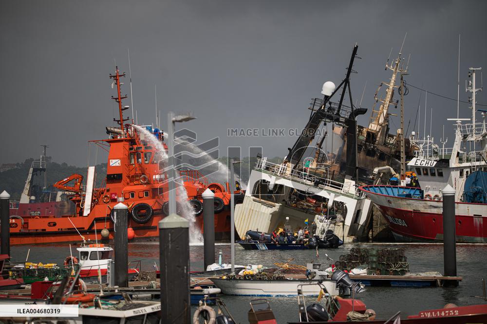 A Ship Continues To Burn In The Port Of Ribeira - Spain
