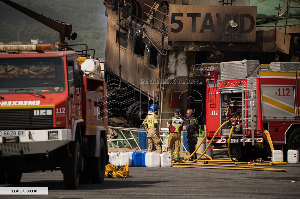 A Ship Continues To Burn In The Port Of Ribeira - Spain
