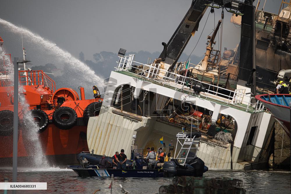 A Ship Continues To Burn In The Port Of Ribeira - Spain