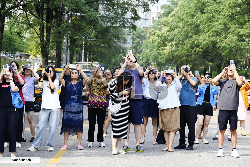 Citizens Watch Military Parade Aircraft in Beijing
