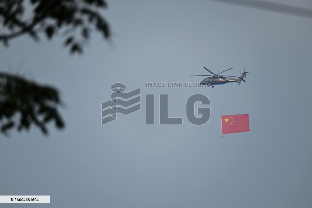 Citizens Watch Military Parade Aircraft in Beijing