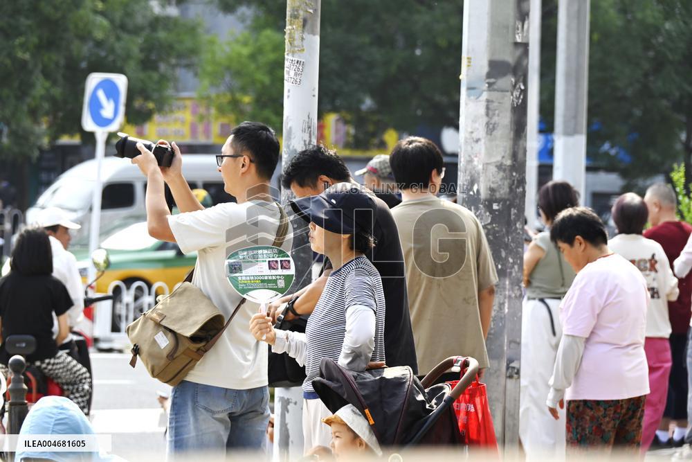 Citizens Watch Military Parade Aircraft in Beijing