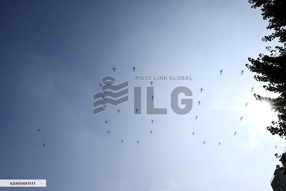 Citizens Watch Military Parade Aircraft in Beijing