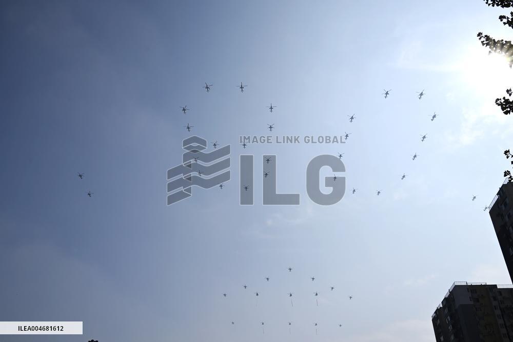 Citizens Watch Military Parade Aircraft in Beijing